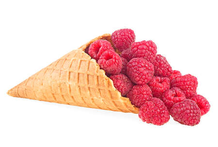 Fresh raspberry in waffle cup isolated on a white backgroundの写真素材