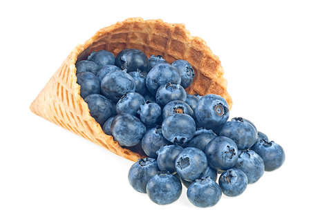 Fresh blueberry in waffle cup isolated on a white backgroundの写真素材