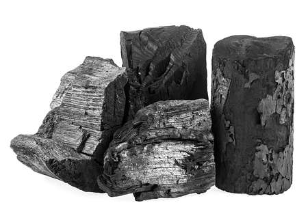 Pieces of natural wood charcoal isolated on a white background. Traditional charcoal.の写真素材