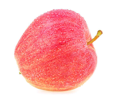 Fresh ripe red apple with water drops isolated on a white background. Wet red apple.の写真素材