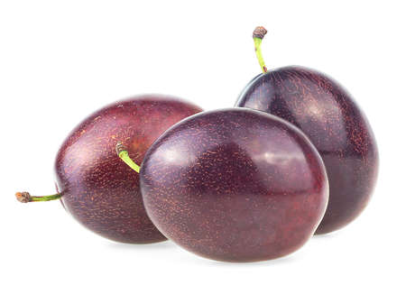 Three fresh plums isolated on a white background. Juicy purple plums.の写真素材
