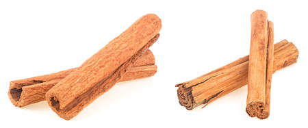 Aromatic cinnamon sticks isolated on a white background. Cassia and Ceylon cinnamon sticks.の写真素材