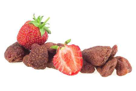 Fresh strawberry and dried strawberry isolated on a white background. Sweet and sour dried strawberries.の写真素材