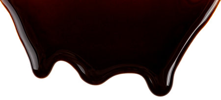 Melting chocolate drips isolated on a white background. Chocolate streams.の写真素材
