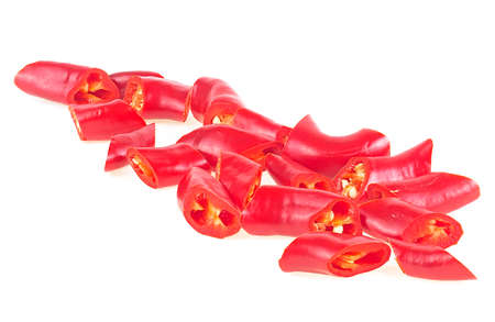 Front view of red chopped chili peppers isolated on a white background. Red hot chili pepper.の写真素材