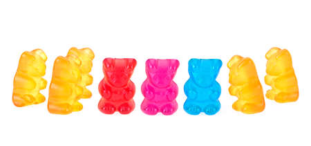 Children's multivitamin. Colorful jelly gummy bears isolated on a white background. Sweet gummy bears.の写真素材