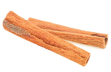 Front view of aromatic dried cinnamon sticks, white background. Cinnamon stick spice.の写真素材