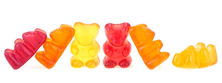 Group of gummy bears isolated on a white background. Colorful jelly bears. Assorted fruit flavored gummy bears.の写真素材