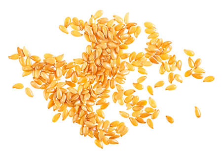 Dry organic golden flax seeds isolated on a white background. top view. Yellow Flax seeds.の写真素材