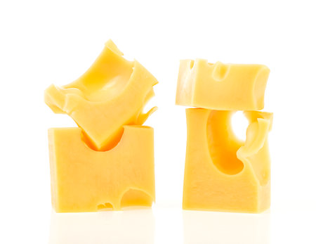 Cheese cube isolated on a white background. Slices of cheese. Pieces of cheese.の写真素材
