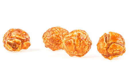 Delicious caramel popcorn isolated on a white background. Creme caramel popcorn.の写真素材