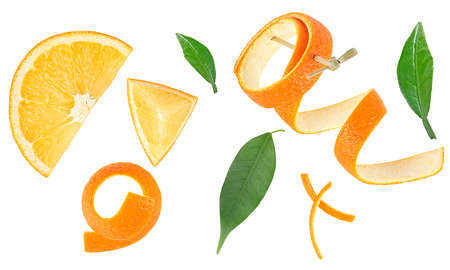 Top view of orange fruit isolated on a white background - orange slice, zest of orange and leaves of orange tree.の写真素材