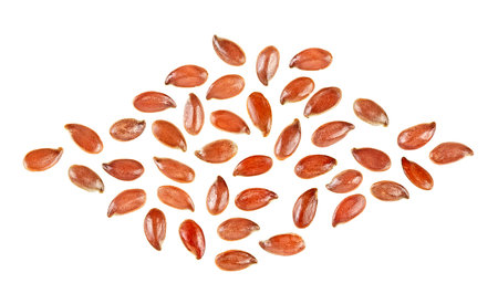 Brown linseeds isolated on a white background, top view. Seeds of flax.の写真素材