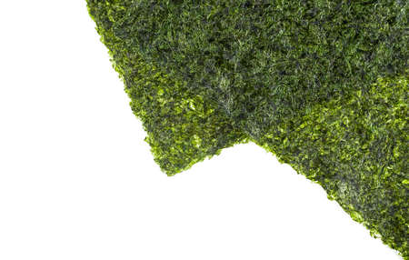 Japanese food - nori leaf. Close-up of nori leaves on a white background, top view. Appetizer made from kelp.の写真素材