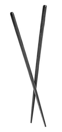 Black wooden chopsticks isolated on a ukwhite background, top view.の写真素材