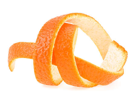 Orange skin in spiral form isolated on a white background, front view. Citrus zest. Citron.の写真素材