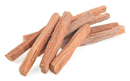 Chandan or sandalwood isolated on a white background. Sandalwood sticks. perfume.の写真素材