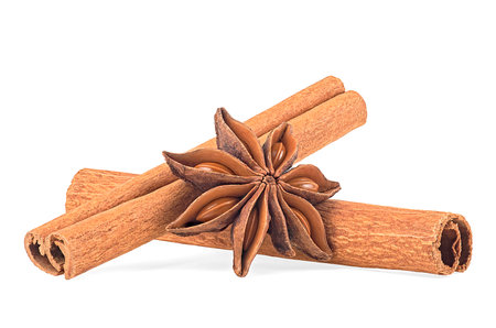 Cinnamon sticks and star anise spice isolated on a white backgroundの写真素材