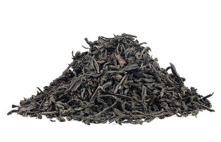Dry black tea leaves isolated on a white background. Ceylon black tea.の写真素材