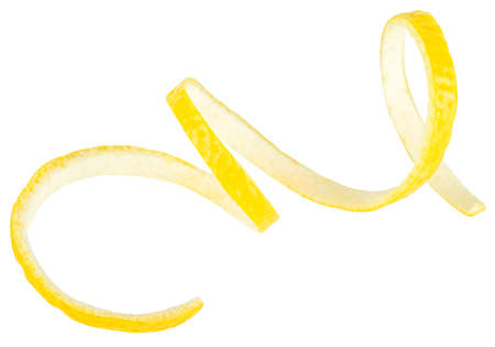 Twisted lemon peel isolated on a white background, clipping path. Ripe lemon skin, food healthy.の写真素材