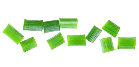 Chopped fresh green onions isolated on a white background, top view. Heap of cut chives.の写真素材