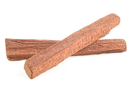 Aromatherapy - two scented sandalwood sticks isolated on a white background. Aromatic natural wood incense.の写真素材
