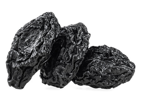 Raw organic prunes isolated on a white background. Dried and smoking plums.の写真素材