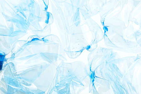 Used plastic bottles as a background, top view. recycling problem.の写真素材