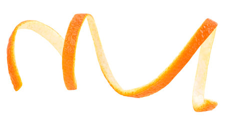 Orange peel or orange twist isolated on a white background. Citrus fruit. Orange zest spiral.の写真素材