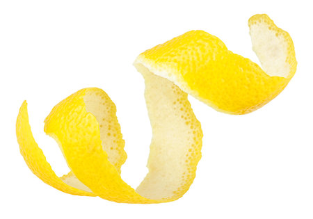 Fresh lemon skin or lemon zest isolated on a white background. Citrus twist peel.の写真素材