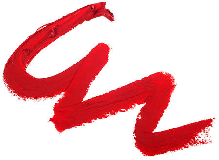 Red lipstick stroke isolated on a white background. Lipstick smear smudge.の写真素材