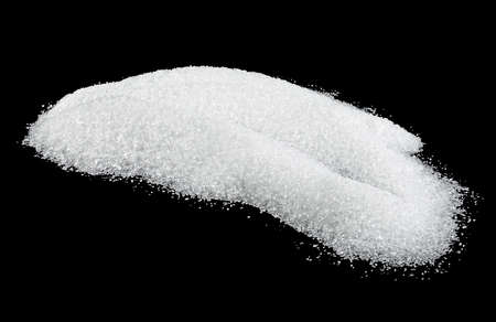 Pile of white salt on a black background. Crystals of sea salt.の写真素材