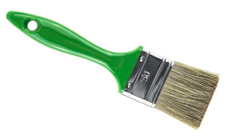 Green paint brush isolated on a white background, top view.の写真素材