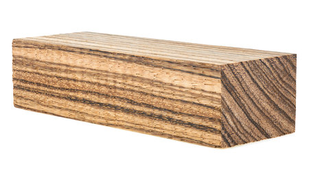 Wooden bar isolated on a white background. Zebrano, an exotic wood species. Zingana, zebrawood.の写真素材