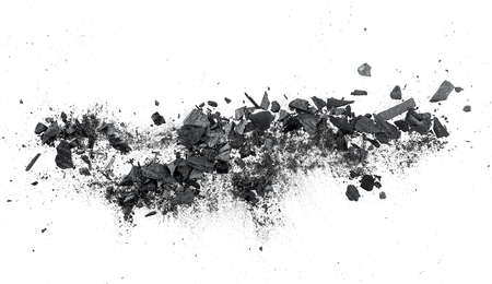 Black coal dust with fragments isolated on a white background, top view.の写真素材