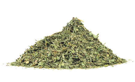 Pile of dried and chopped celery leaves isolated on a white backgroundの写真素材