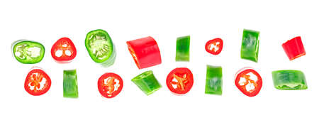 Top view of green and red chilli pepper slices isolated on a white backgroundの写真素材