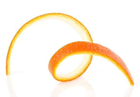 Orange peel isolated on a white background. Spiral orange skin.の写真素材