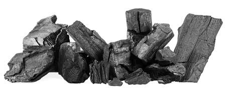 Pile of natural hardwood charcoal isolated on a white backgroundの写真素材