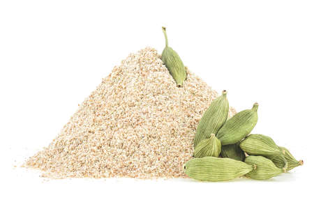 Pile of cardamom powder and cardamom pods isolated on a white background. Ground cardamom and whole capsules.の写真素材