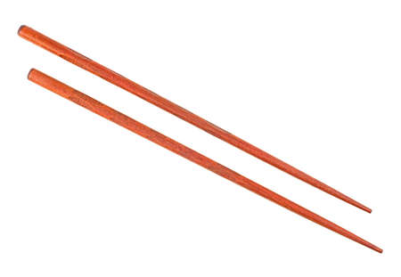 Wooden chopsticks isolated on a white background. brown color.の写真素材