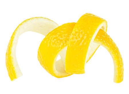 Lemon twist isolated on a white background. Zest of fresh lemon fruit.の写真素材
