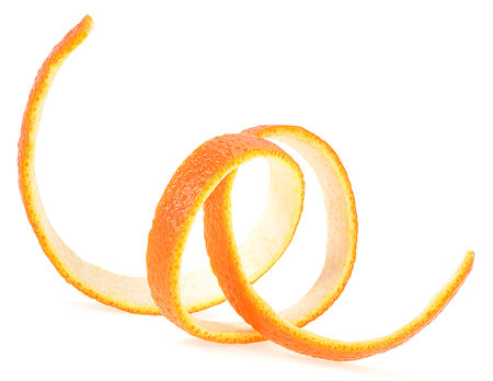 Spiral orange peel isolated on white background. Curly orange zest.の写真素材