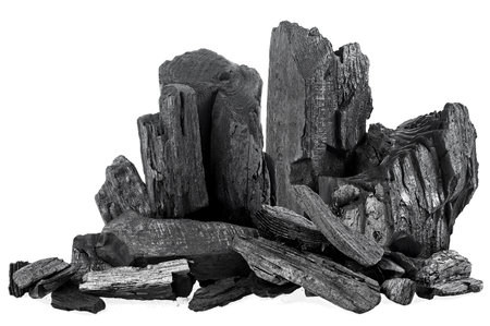 Pile of natural black activated charcoal isolated on a white backgroundの写真素材