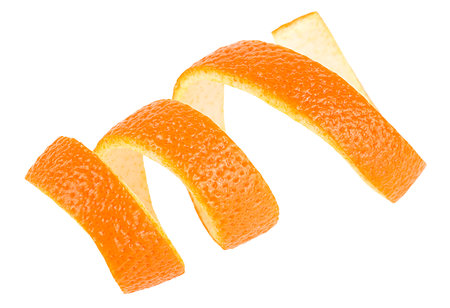 Peel of fresh orange fruit isolated on a white background. Orange zest.の写真素材