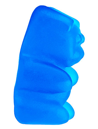 Blue jelly gummy bear isolated on a white background. Sweet jelly candy.の写真素材