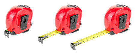 Collection of measuring tapes isolated on a white backgroundの写真素材