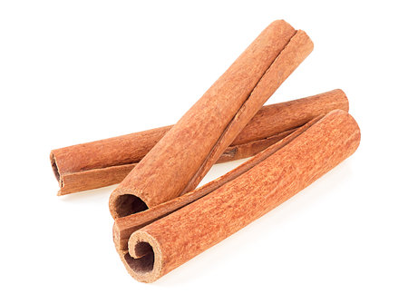 Three cinnamon sticks isolated on a white background. Cinnamon stick spice.の写真素材