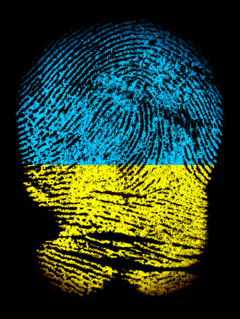 Fingerprints in colors of Ukraine flag, black background.の写真素材