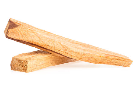 Holy wood - Palo Santo incense wood sticks isolated on a white background. Bursera Graveolens.の写真素材